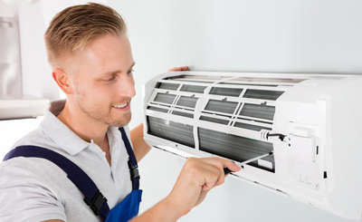 Air conditioner repair technician